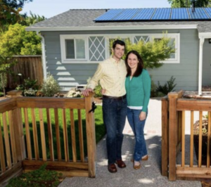 Happy Homeowners with Solar Panels Installed by Evergreen Solar Solutions – Sustainable Energy for Florida Homes